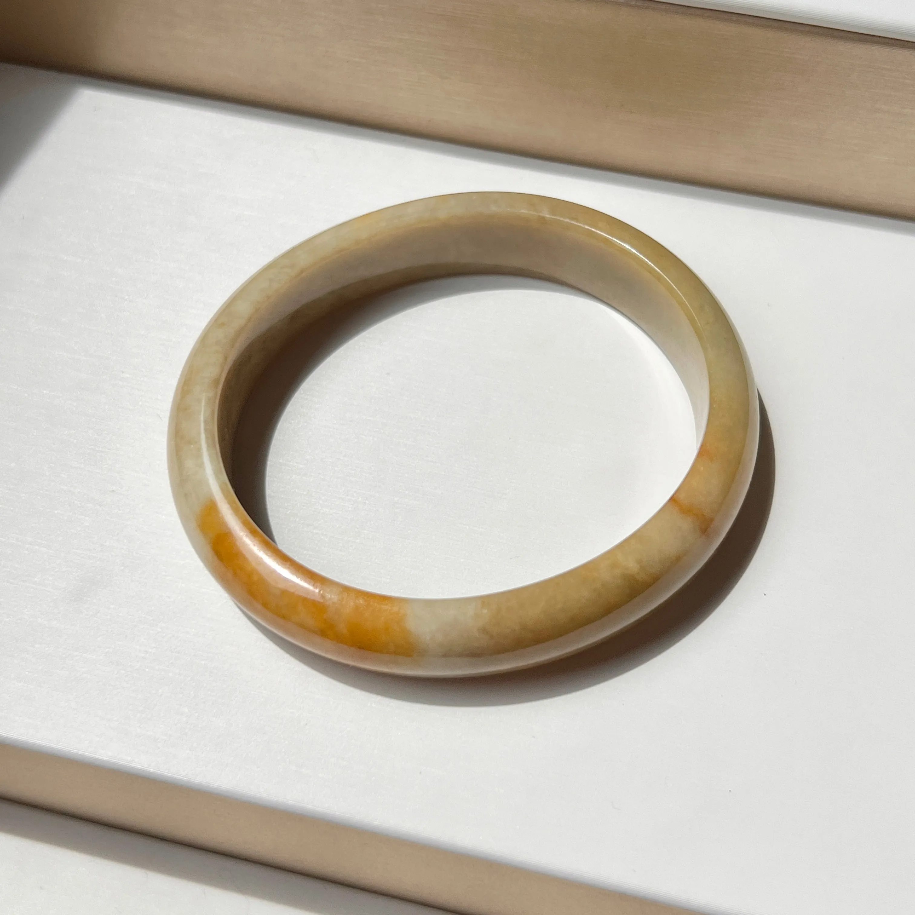 53.5mm A-Grade Natural Russet Jadeite Modern Oval Bangle No. 152012